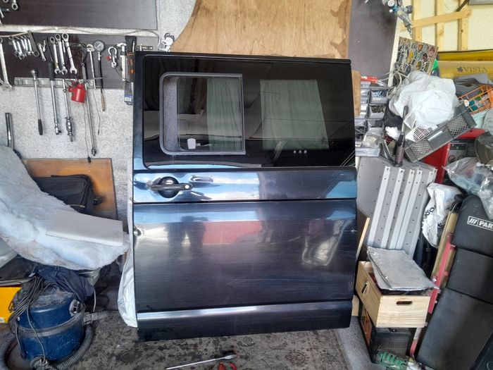 Wv T5 Sliding door  2007 with sliding window  black in coloure