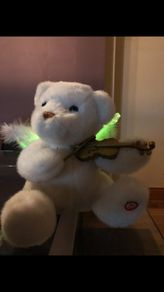 Angel Bear, plays Silent Night on violin