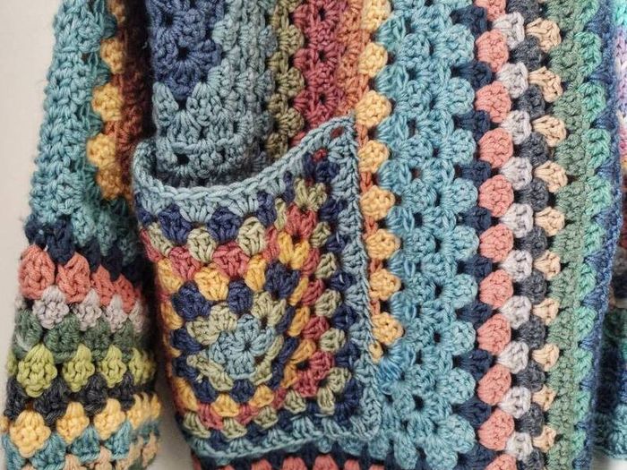 Crocheted colourful hexagon jacket