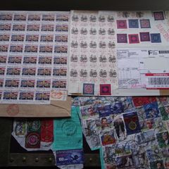 A small box with collection of stamps from overseas.