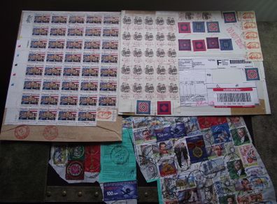 A small box with collection of stamps from overseas.