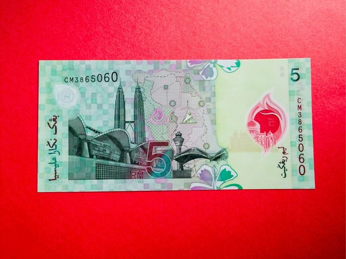 Malaysia  5. Ringgit. 2004 Pick. 47 POLYMER PLASTIC ( Uncirculated).