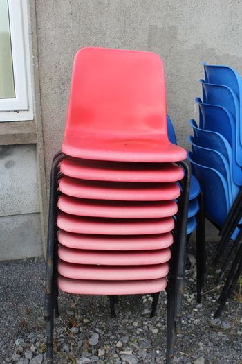 Stackable plastic chairs - blue and orange