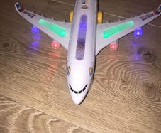 Toy plane light up moving music a380