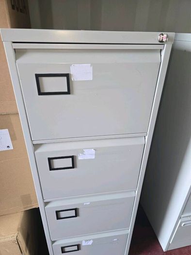 40 second-hand 4 drawer filing cabinets.