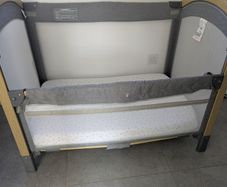 Cot/next to me