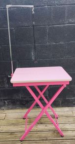 Dog grooming table