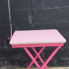 Dog grooming table