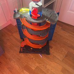 Bundle of Hot wheels, tower, and 2 tracks