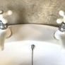 White Ceramic Over Counter Basin with White Taps Image 2