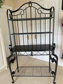 Black wrought iron with black marble shelving