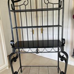 Black wrought iron with black marble shelving