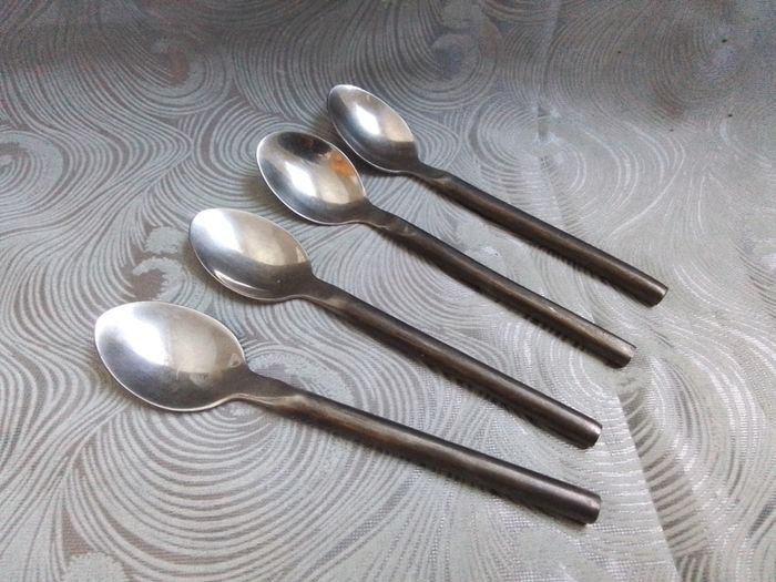 Four Heavy Steele Spoons