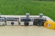 Four Kodak instamatic cameras