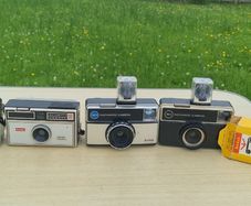 Four Kodak instamatic cameras