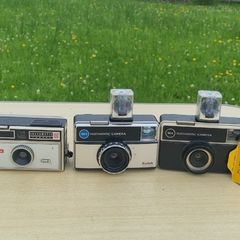 Four Kodak instamatic cameras