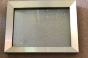 Glass photo frame Size:5x7  Small scratch on top of frame as shown