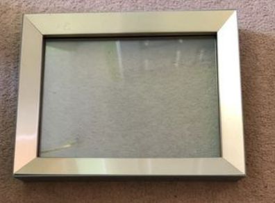 Glass photo frame Size:5x7  Small scratch on top of frame as shown