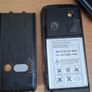 Sony Ericsson W200i , with charger and speakers. Image 9