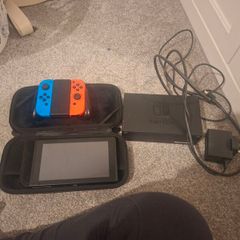Nintendo switch, case, docking station, controller and optional 2 games