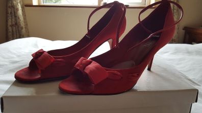 Red peetoe sandals from Carl scarpa