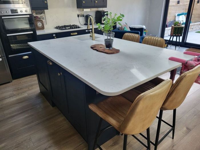 Kitchen units, island and quartz worktops.