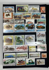 Ace Black 32 page/ 16 leaf Stamp Album with over 900 stamps. Thematic of Animals, Plants, Classic Cars, Space, Trains, Sport & Disney noted.