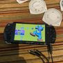 PSP  Console plus 10 games, charger and headphones Image 4