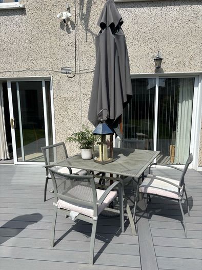 Patio table with Parasol and 4 chairs