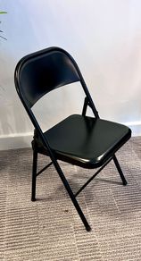 18 x Black metal folding chairs