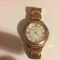Orginal ladies gold guess watch post available