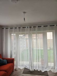 Sheer curtain and pole