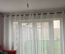 Sheer curtain and pole