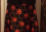 Black vintage full length skirt with orange floral print
