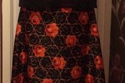 Black vintage full length skirt with orange floral print