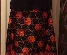 Black vintage full length skirt with orange floral print