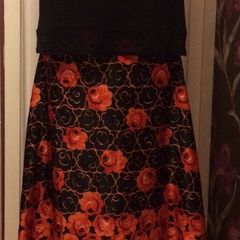Black vintage full length skirt with orange floral print
