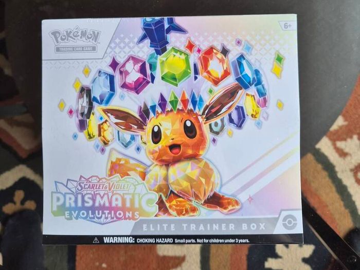 Pokemon Prismatic Evolutions Elite Trainer Box