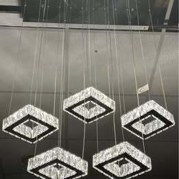 L.E.D. 5 piece Crystal chandelier. Brand new in box