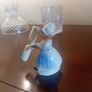 vintage porcelain egg timer featuring a dutch girl in traditional dress Image 2