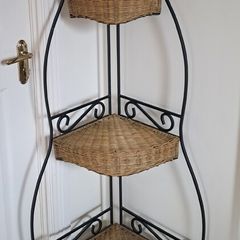 Wrought iron and wicker corner shelf unit
