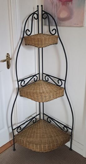 Wrought iron and wicker corner shelf unit