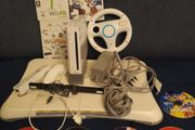 Wii + balance board, Mario kart, steering wheel, dance games