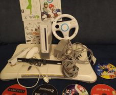 Wii + balance board, Mario kart, steering wheel, dance games