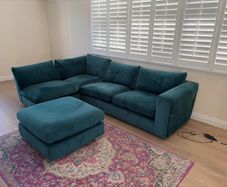 Teal Blue L shaped couch and footstool