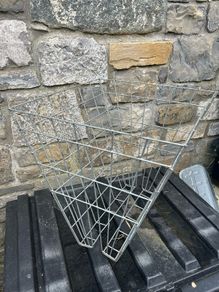 Double sided hay racks and double bucket holder