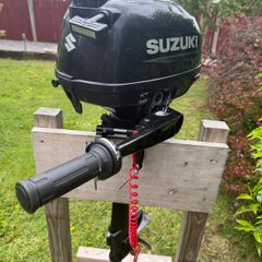 Suzuki 2.5hp and inflatable boat (bark 3.3m)