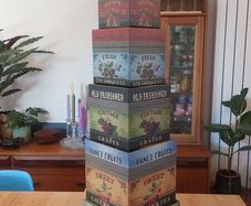 Fabulous Set of Seven Graduated Stackable Nesting Storage Boxes by Quality Manufacturer Bob's Boxes/Lang Paper Co. with "Fancy Fruits" Artwork by Kimberly Poloson