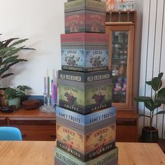 Fabulous Set of Seven Graduated Stackable Nesting Storage Boxes by Quality Manufacturer Bob's Boxes/Lang Paper Co. with "Fancy Fruits" Artwork by Kimberly Poloson