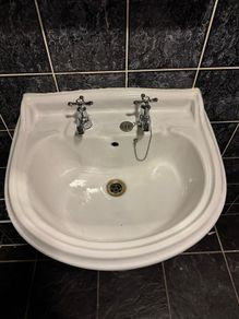 bathroom sink with pedestal